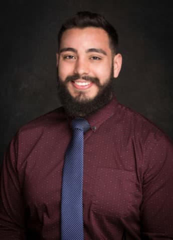 Dr. Adam Martinez
