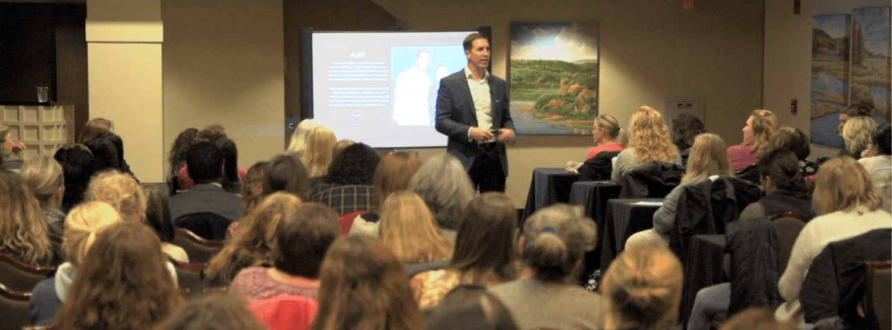 Dr. Steve Tullius presenting a workshop to a packed room